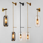 Postmodern Capsule Wall Hanging Light Clear Glass 1 Bulb Bedside Wall Mounted Lamp with Interior Mesh Guard in Black/Gold