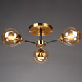 Black and Brass Radial Flush Mount Lighting Postmodern Metal Semi Flush Ceiling Light with Ball Glass Shade
