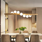 Nordic Linear Wood Island Pendant with Globe Shape Glass Island Light in Beige for Dining Room