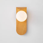 Exuro Indoor Wall Sconce in Wood / Walnut