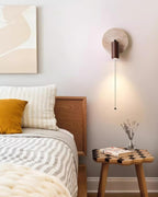 Evzoryra Wall Lamp Disc Swing in Travertine