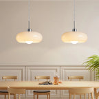 Hanging lamp with an opalescent shade – an elegant retro Bauhaus accent