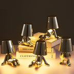 Designer LED Table Lamp Sitting Man with Glossy Finish