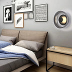 Modern wall lamp with a round shade