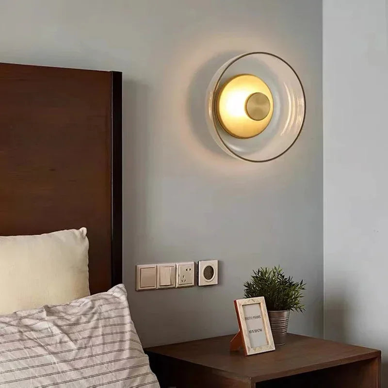 Modern wall lamp with a round shade