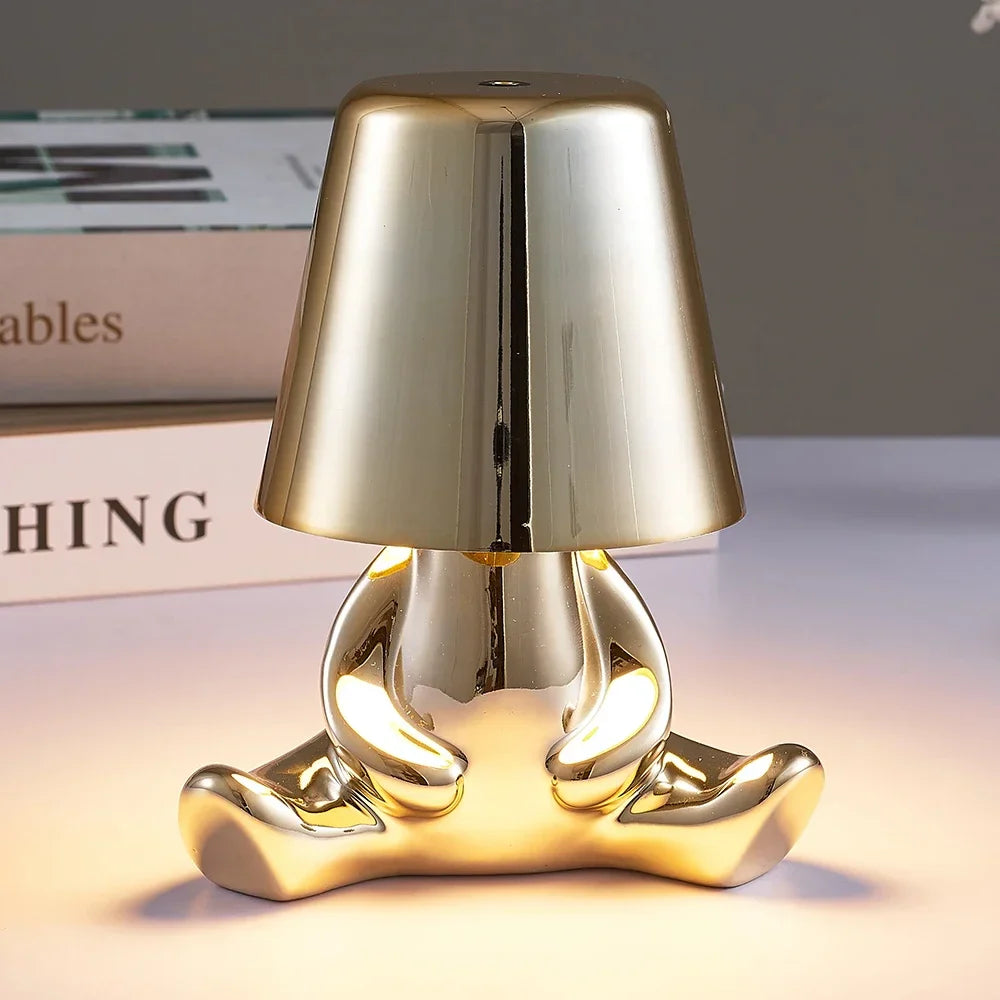 Designer LED Table Lamp Sitting Man with Glossy Finish