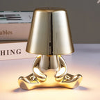 Designer LED Table Lamp Sitting Man with Glossy Finish