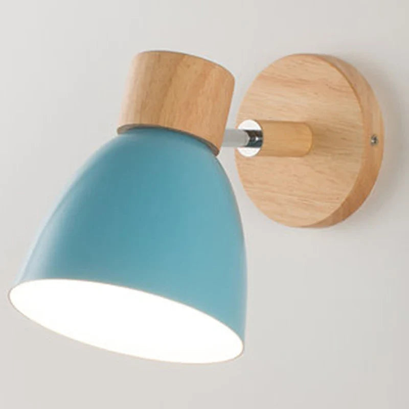 Modern wall lamp with a wooden base and metal shade