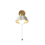 Wall lamp with wavy shade and chain