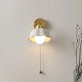 Wall lamp with wavy shade and chain