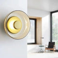 Modern wall lamp with a round shade