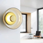 Modern wall lamp with a round shade