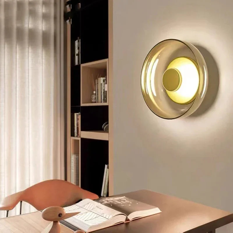 Modern wall lamp with a round shade