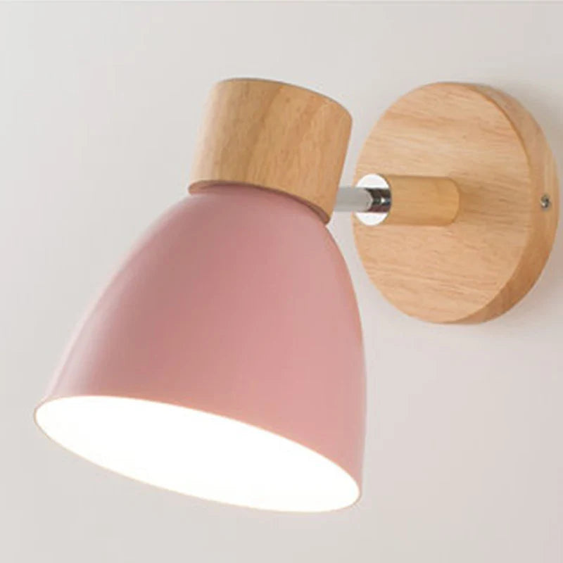 Modern wall lamp with a wooden base and metal shade