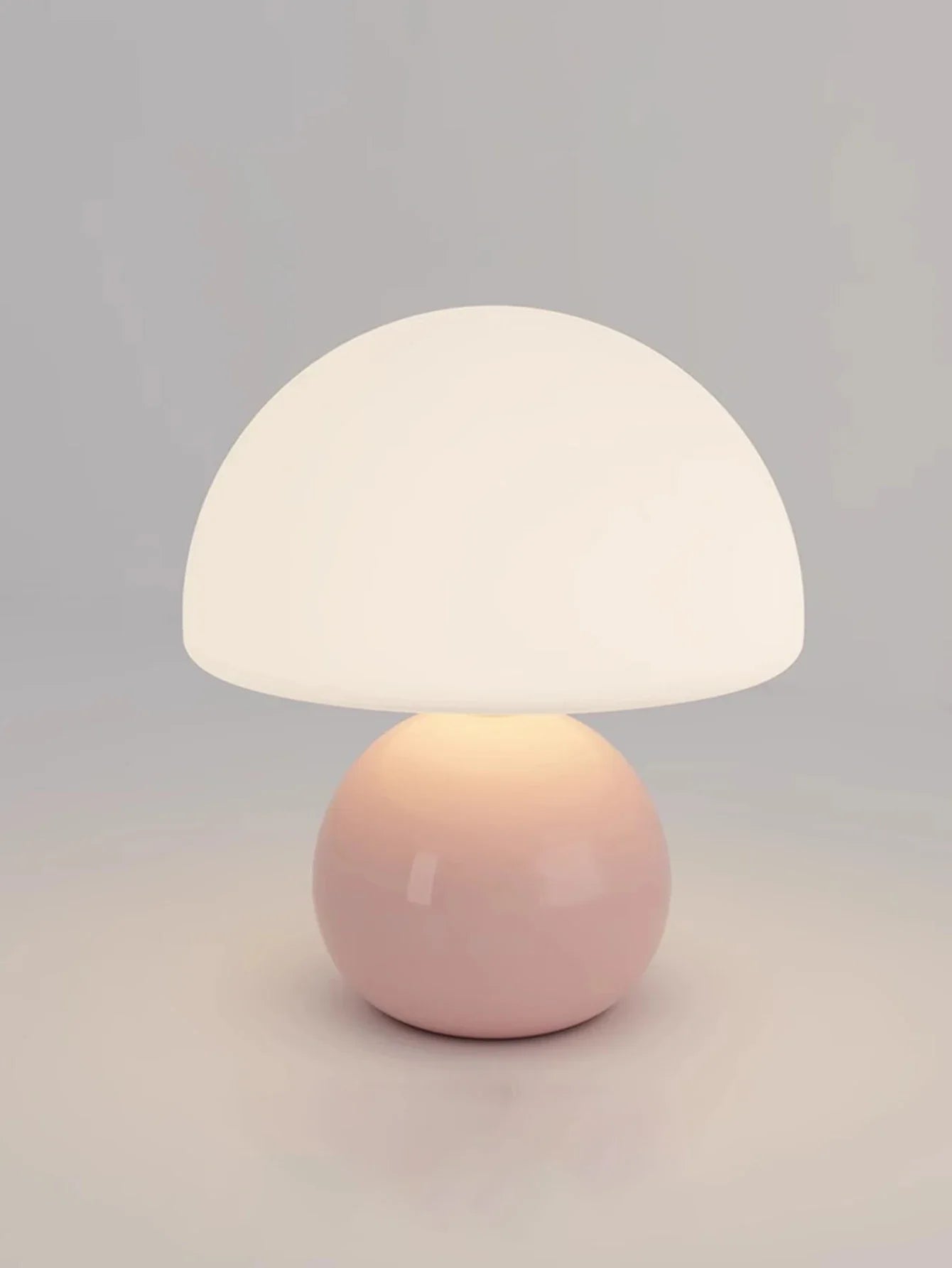 Modern table lamp with a spherical base and mushroom-shaped shade – minimalist style
