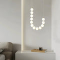 Modern LED pendant lamp – stunning necklace design with light spheres