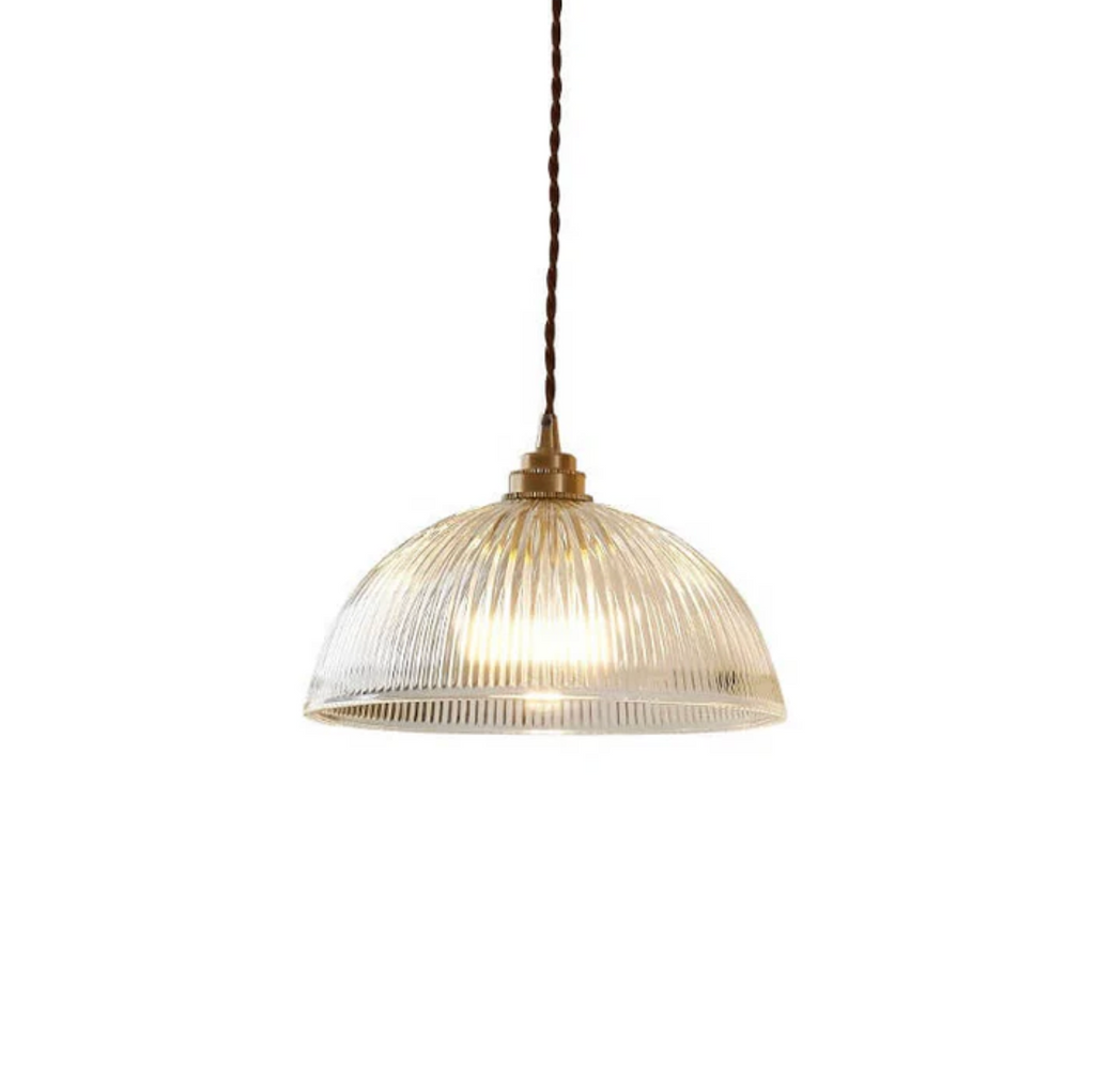 Retro-style glass pendant lamp with an embossed shade and brass finish