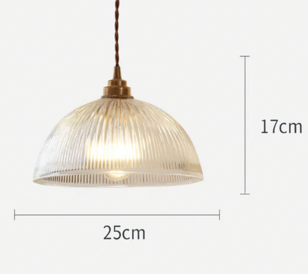 Retro-style glass pendant lamp with an embossed shade and brass finish