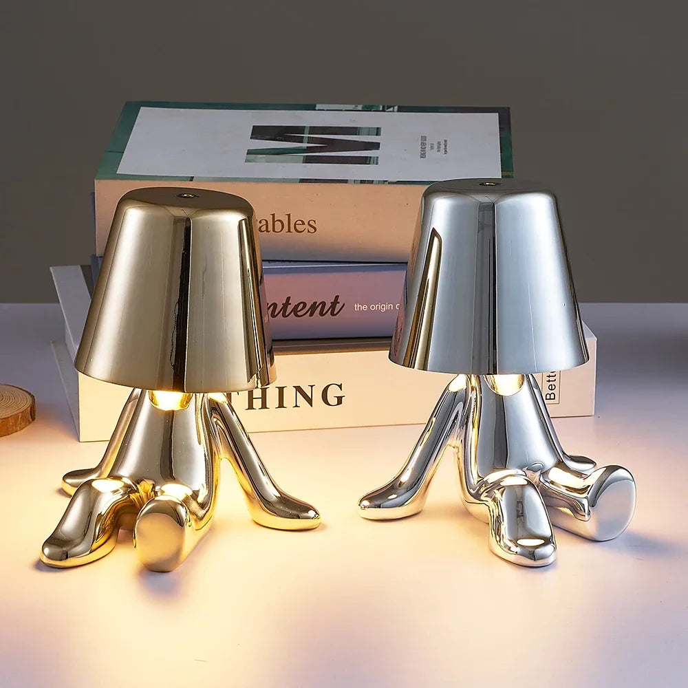 Designer LED Table Lamp Sitting Man with Glossy Finish