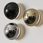 Modern LED wall sconce in the shape of a shimmering ball – wall lighting with a Bauhaus halo effect