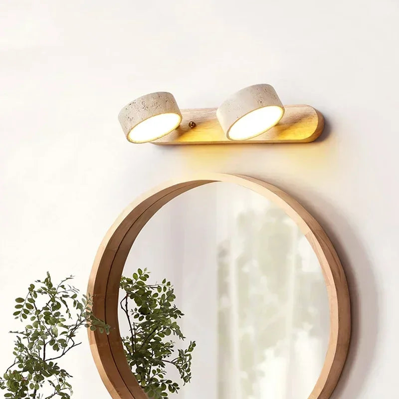 Modern LED wall lamp with rotating shades made of stone and a wooden base
