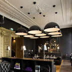 Elegant Black Dome Suspension with Embossed Plaster Interior