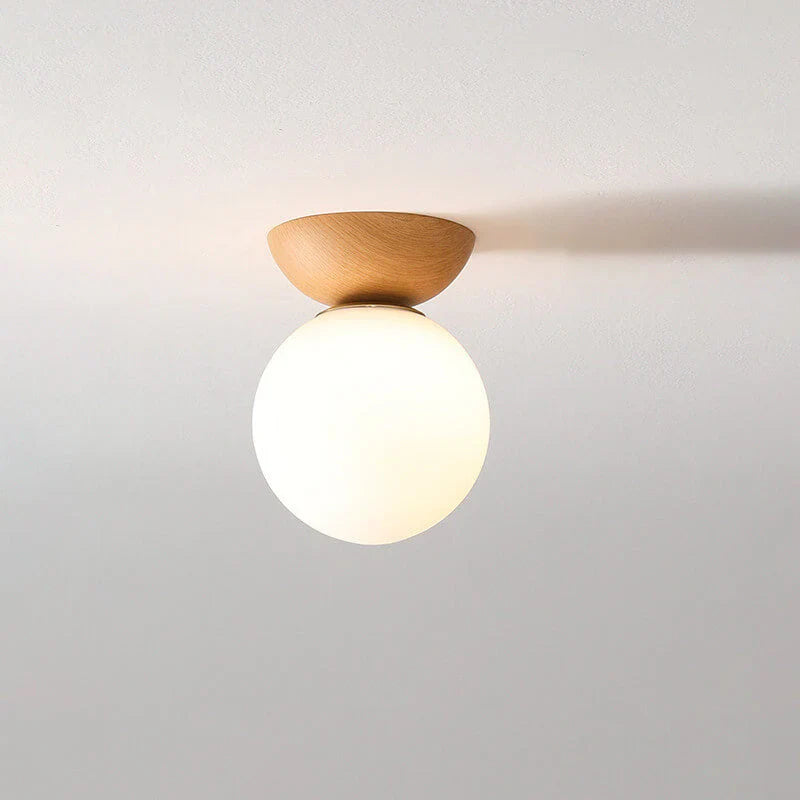 Modern ceiling lamp in Japanese style with a wooden base – minimalist sphere