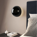 Modern LED wall sconce in the shape of a shimmering ball – wall lighting with a Bauhaus halo effect