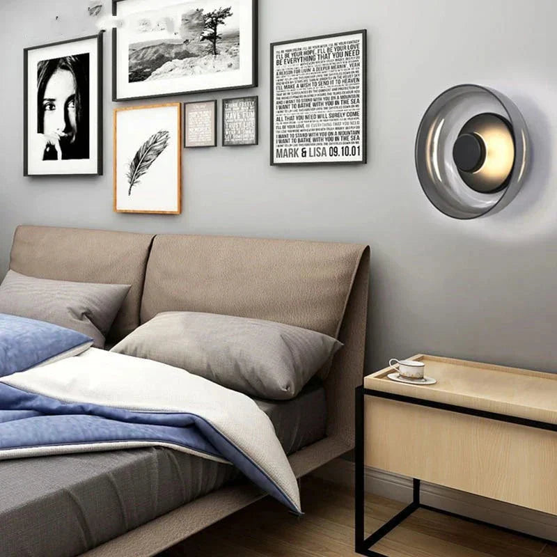 Modern wall lamp with a round shade