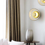 Modern wall lamp with a round shade