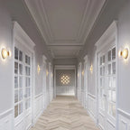 Modern wall lamp with a round shade