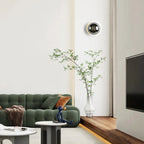 Modern LED wall sconce in the shape of a shimmering ball – wall lighting with a Bauhaus halo effect