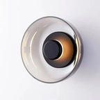 Modern wall lamp with a round shade