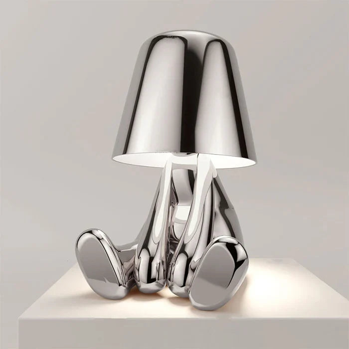 Designer LED Table Lamp Sitting Man with Glossy Finish