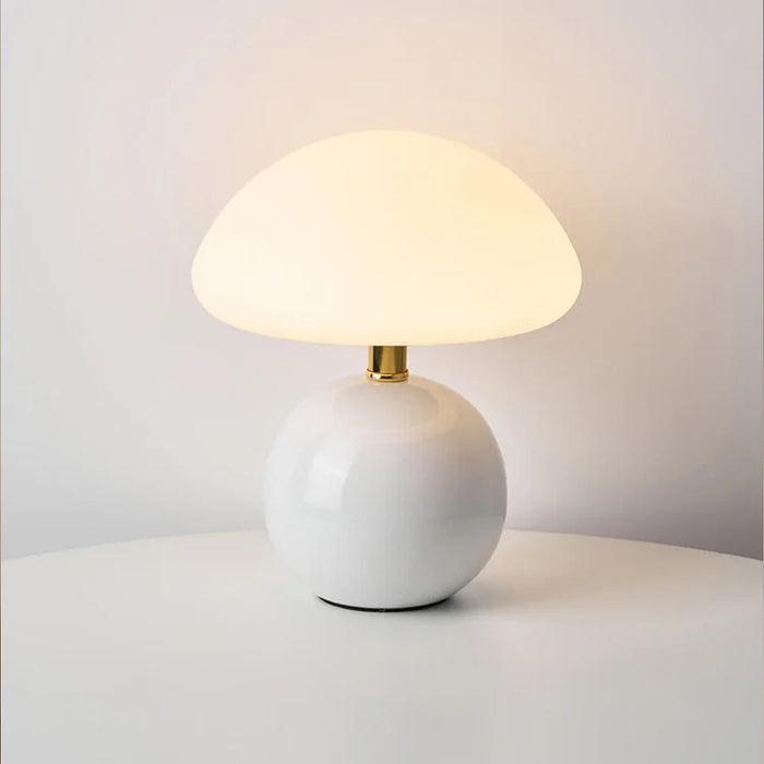 Modern table lamp with a spherical base and mushroom-shaped shade – minimalist style