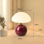 Modern table lamp with a spherical base and mushroom-shaped shade – minimalist style