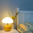 Modern table lamp with a spherical base and mushroom-shaped shade – minimalist style