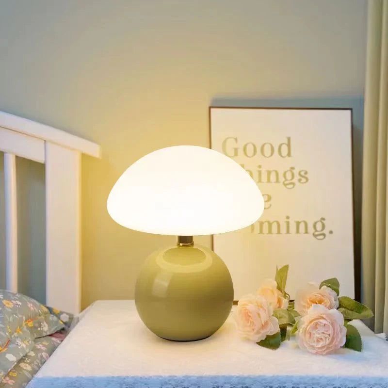Modern table lamp with a spherical base and mushroom-shaped shade – minimalist style
