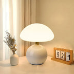 Modern table lamp with a spherical base and mushroom-shaped shade – minimalist style