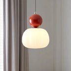 Modern pendant lamp with a spherical decorative element