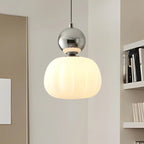 Modern pendant lamp with a spherical decorative element