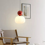 Modern pendant lamp with a spherical decorative element