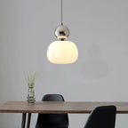 Modern pendant lamp with a spherical decorative element