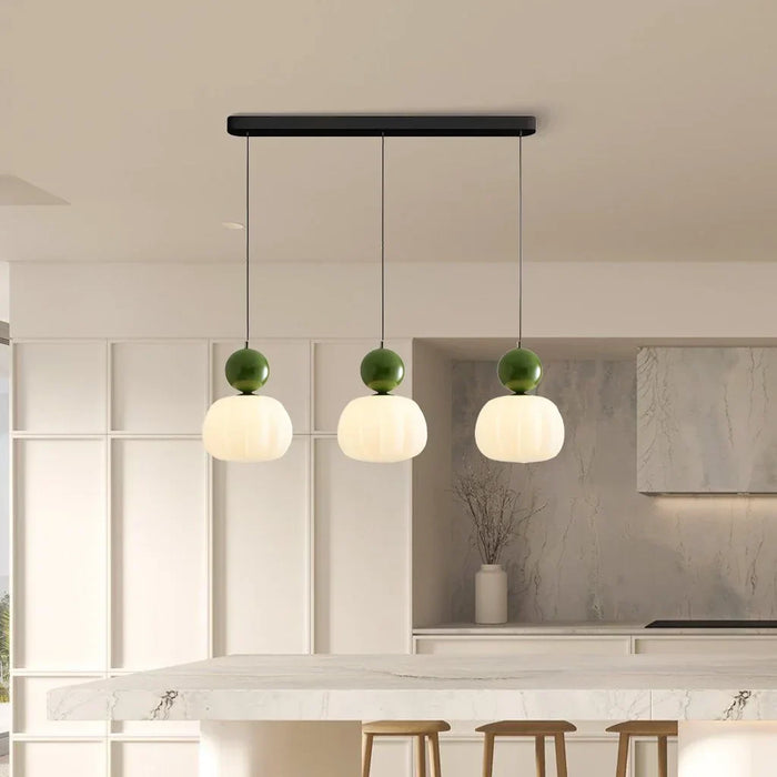 Modern pendant lamp with a spherical decorative element