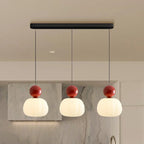 Modern pendant lamp with a spherical decorative element
