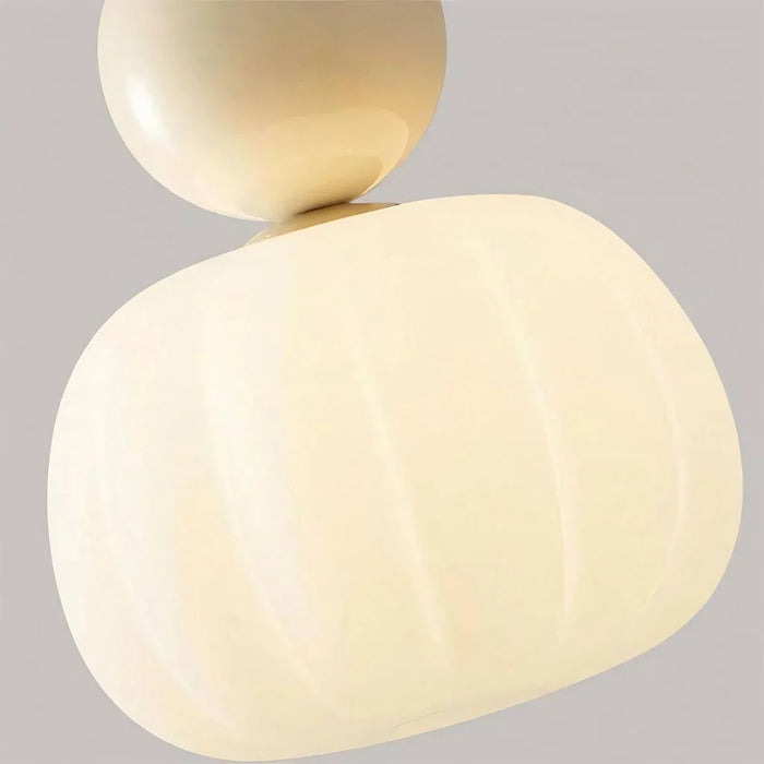 Modern pendant lamp with a spherical decorative element