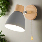 Modern wall lamp with a wooden base and metal shade
